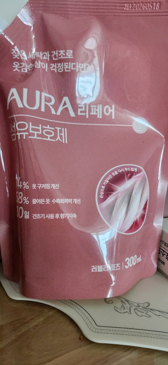 AURA 리페어 유연제 제품 패키지